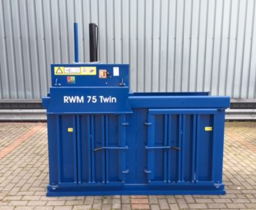 Refurbished twin-chamber waste baler – handle two waste streams at once!